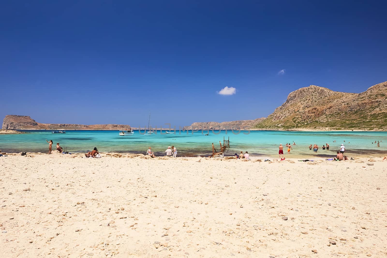 GRAMVOUSA - BALOS, THE CRETE ISLAND, GREECE - JUNE 4, 2019: The beautiful seaview and the people on the beach of Gramvousa.