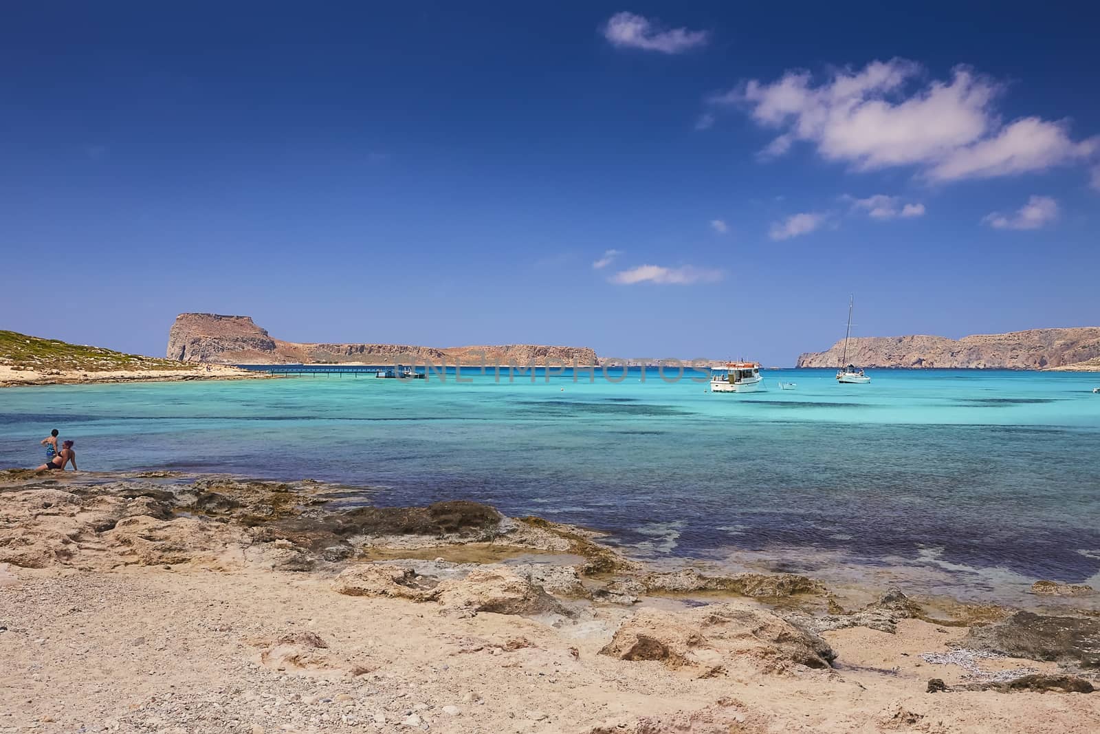 GRAMVOUSA - BALOS, THE CRETE ISLAND, GREECE - JUNE 4, 2019: The beautiful seaview and the people on the beach of Gramvousa.