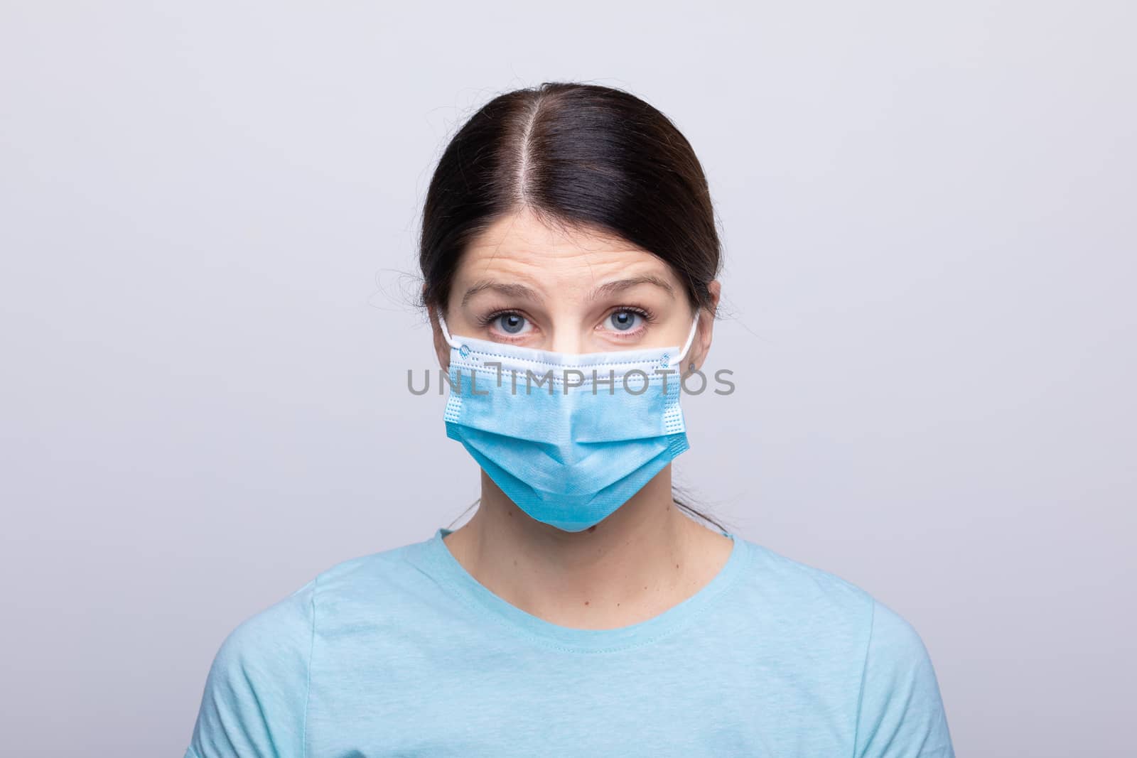 Worried nurse, doctor or scientist portrait behind face mask and protective facemask stock photo