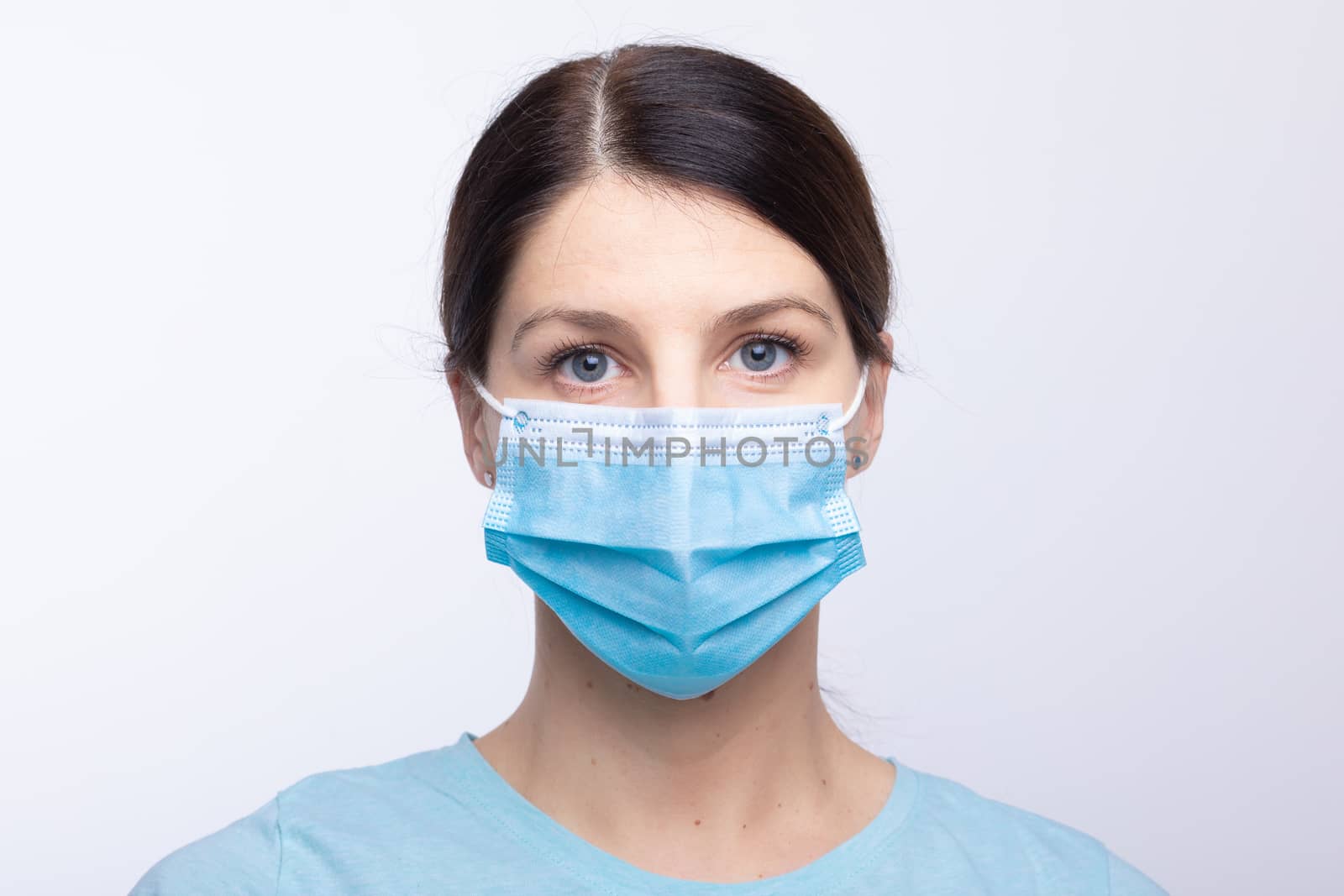 Worried nurse, doctor or scientist portrait behind facemask by adamr