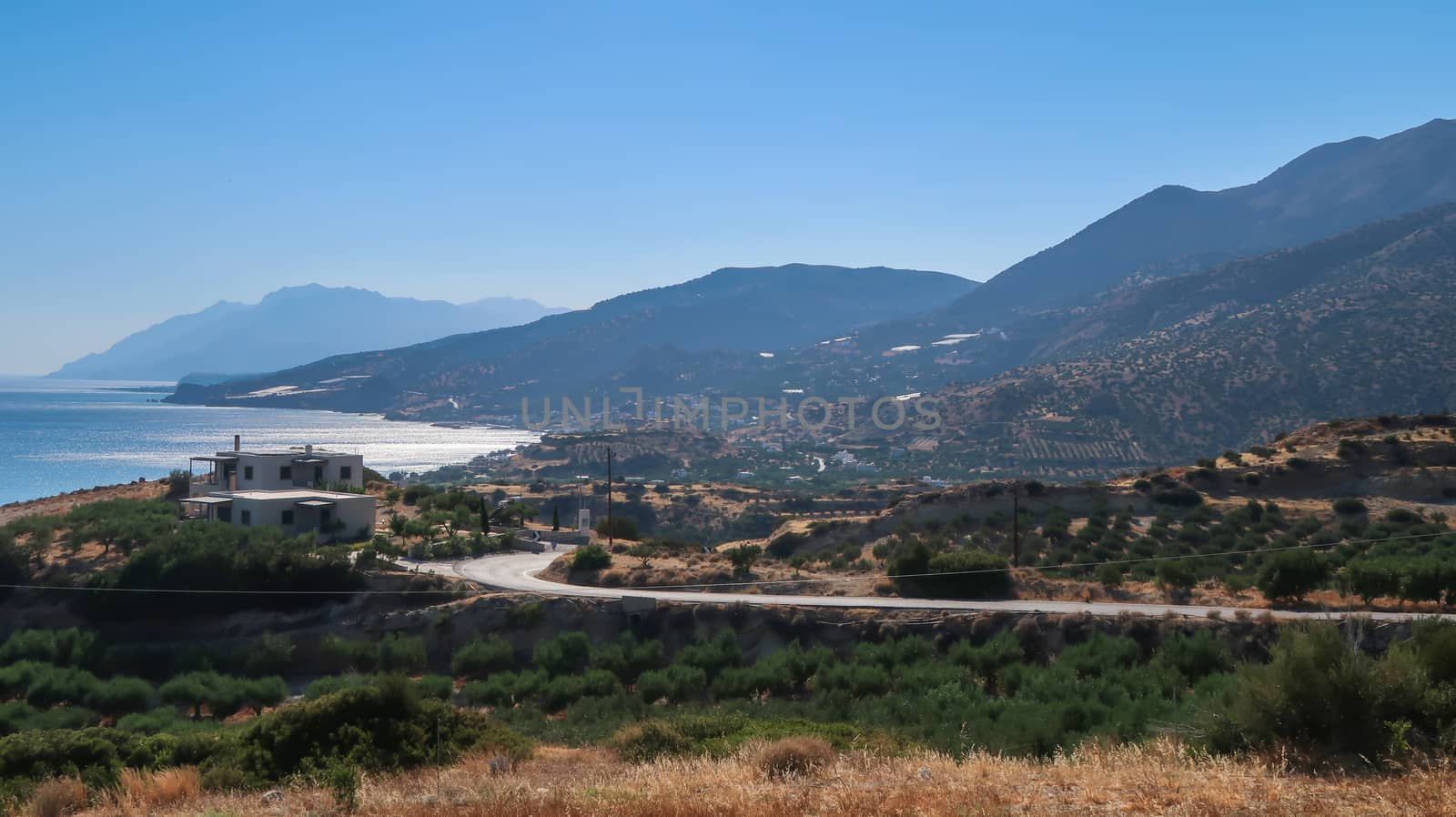 Landscape of the villages, sea and mountains near Keratokampos, Crete by codrinn