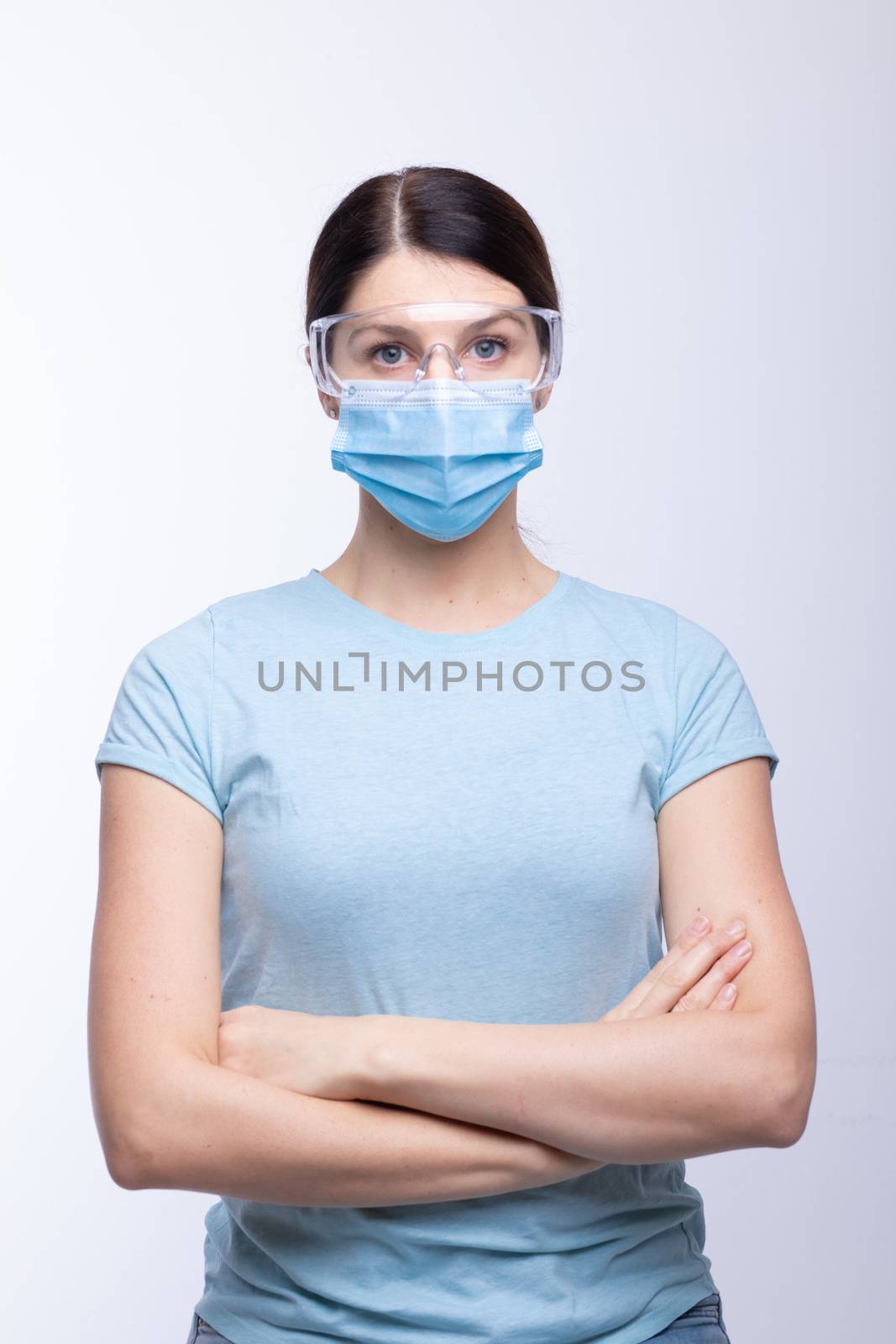 Worried nurse, doctor or scientist portrait behind facemask and  by adamr