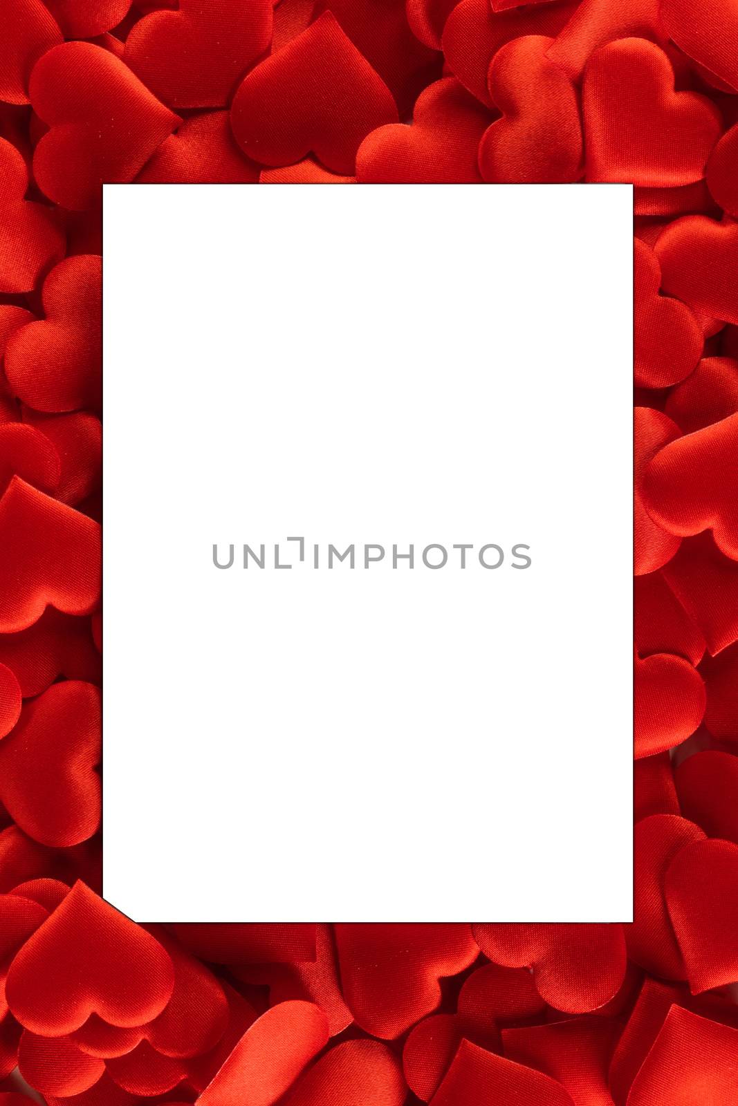 Valentine's day many red silk hearts background , border frame with white card with copy space, love concept