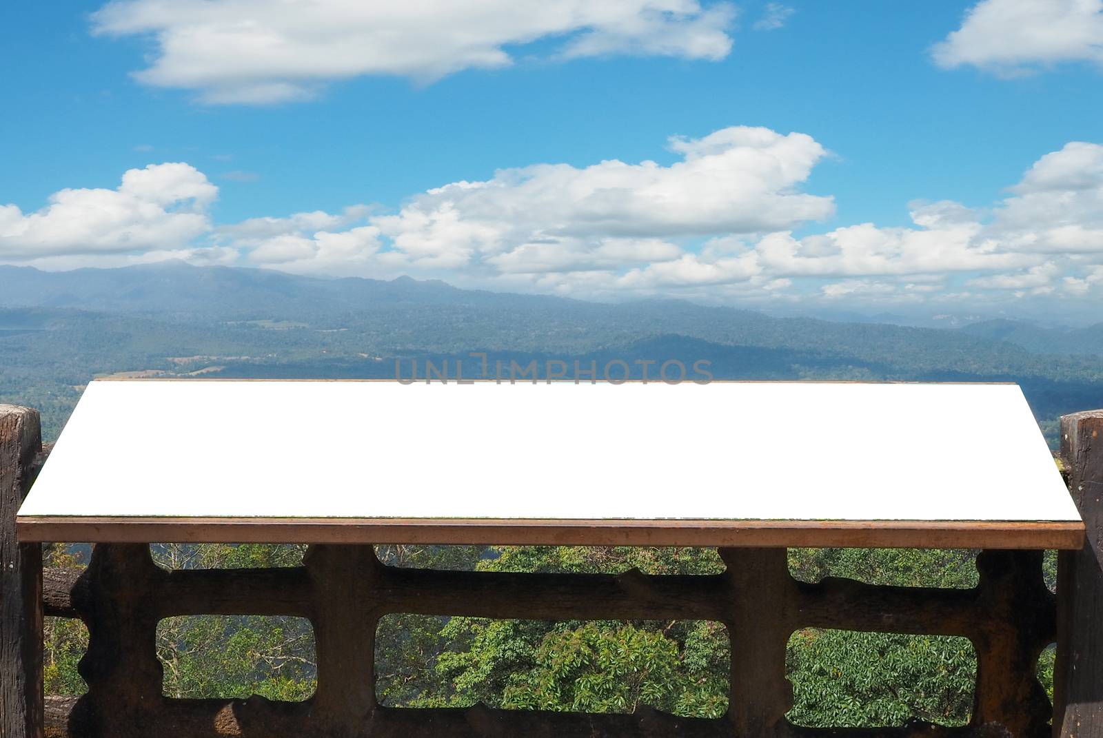 Blank white label On the background are mountains and sky. In the national park