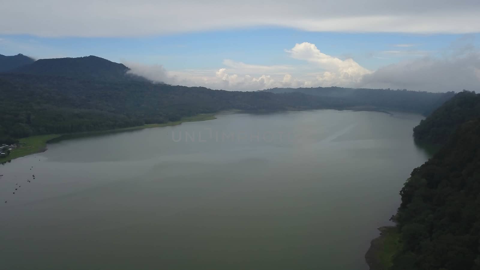 Beatiful aerial drone view over the lake. Lake and mountain view from a hill, Buyan Lake, Bali by Sanatana2008