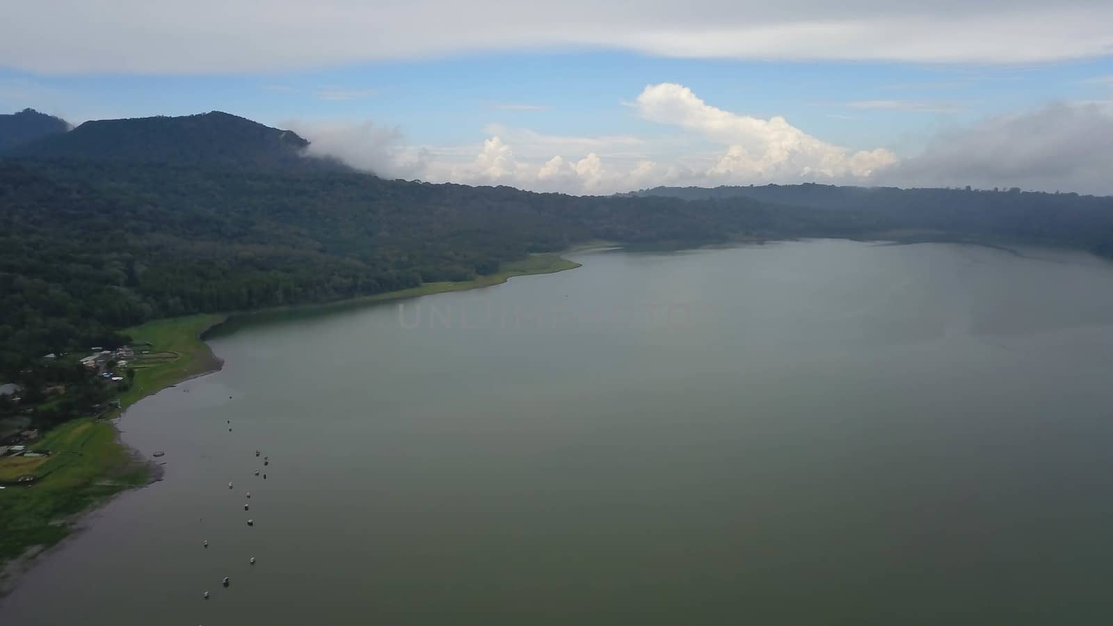 Aerial view to lake Buyan, caldera lake at Bali. Beautiful lake with turquoise water in the mountains of the island of Bali by Sanatana2008