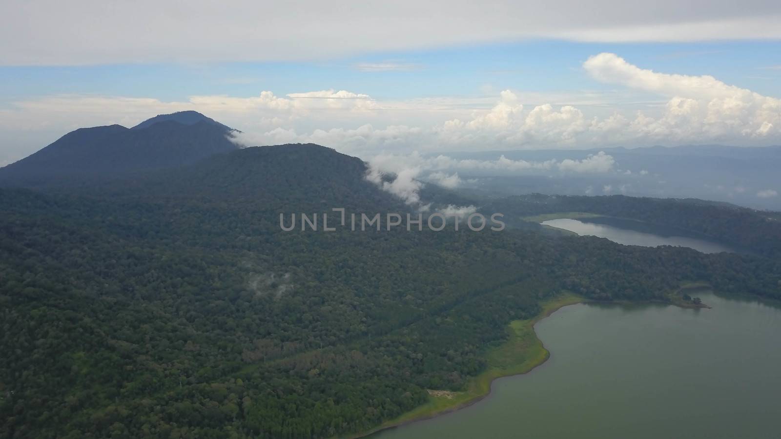 Aerial view of over Twin Lakes Buyan and Tamblingan in North Bali, Indonesia, a caldera lakes at Bali. Beautiful lakes with turquoise water in the mountains of the island of Bali. Landscape, lake.