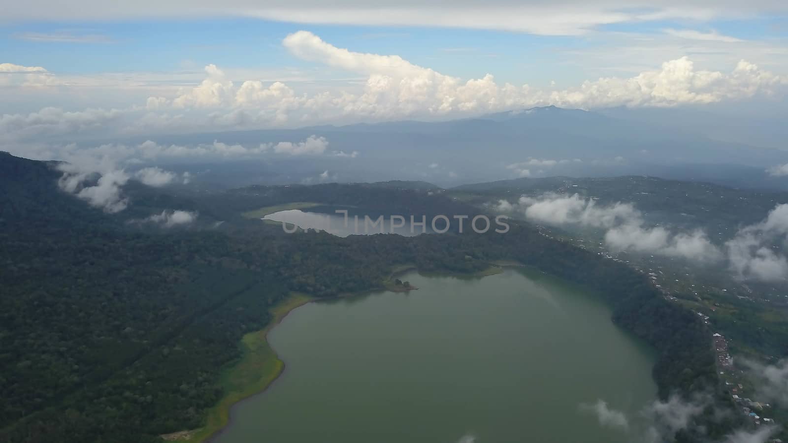 Panoramic aerial view of beautiful twin lakes in an ancient volcanic caldera. Lakes Buyan and Tamblingan, Bali, Indonesia by Sanatana2008