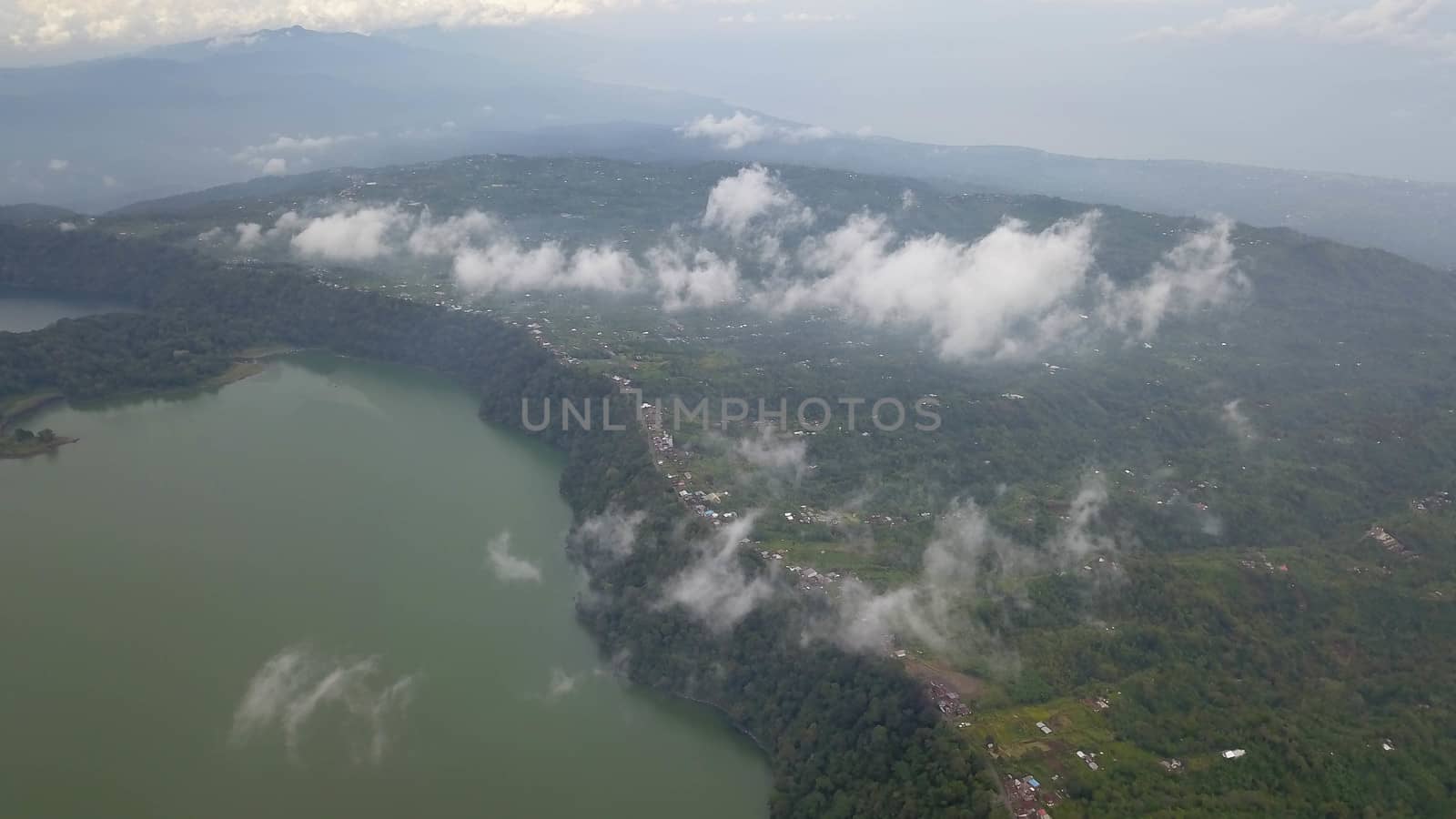 Panoramic aerial view of beautiful twin lakes in an ancient volcanic caldera. Lakes Buyan and Tamblingan, Bali, Indonesia.