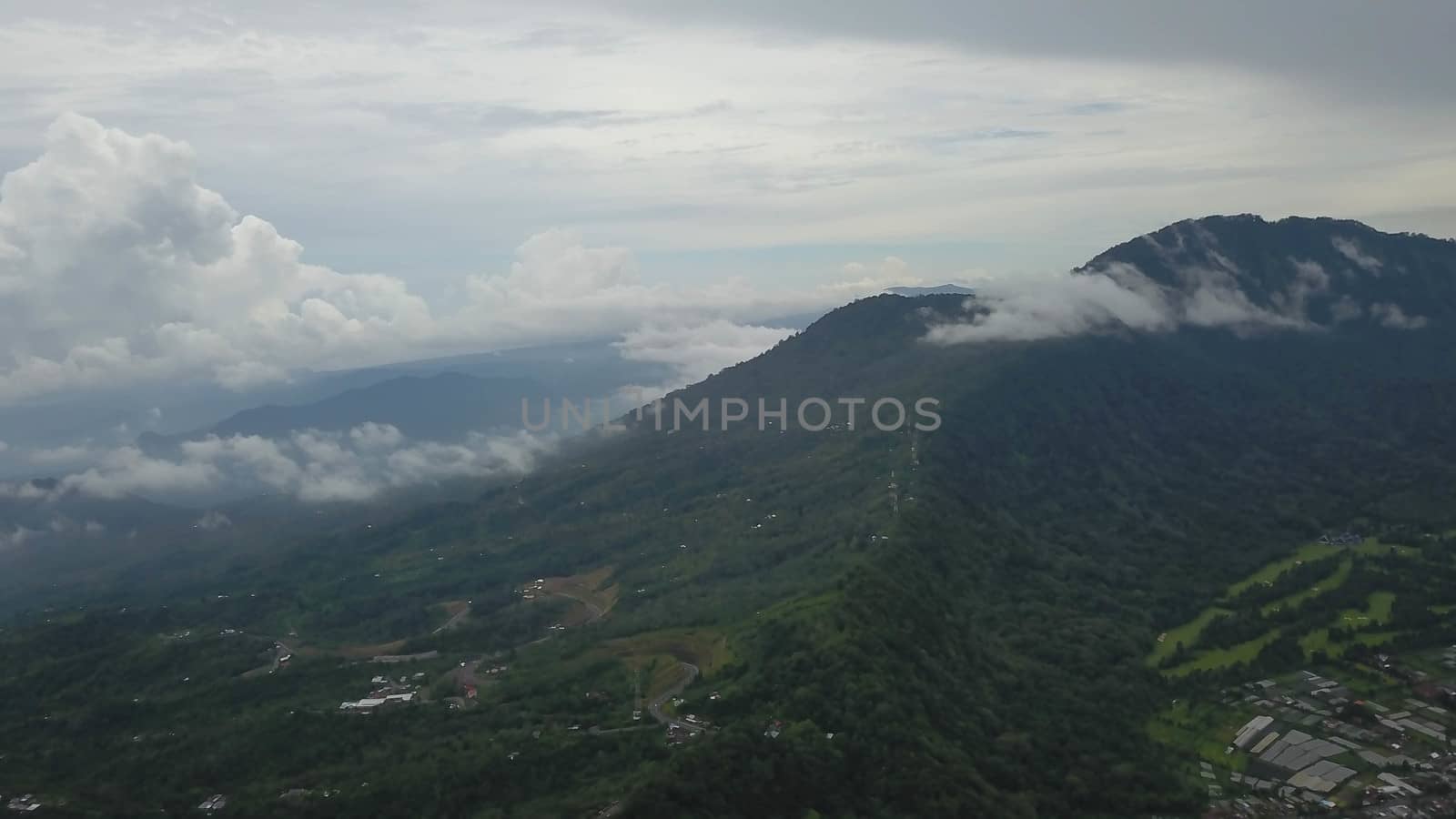 Green Bali landscape. Aerial drone view to Buyan lake and Bedugul village. Indonesia.