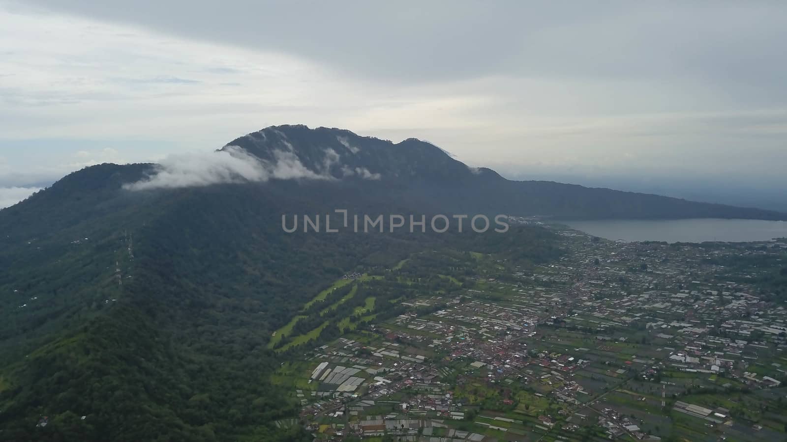 Green Bali landscape. Aerial drone view to Buyan lake and Bedugul village. Indonesia by Sanatana2008