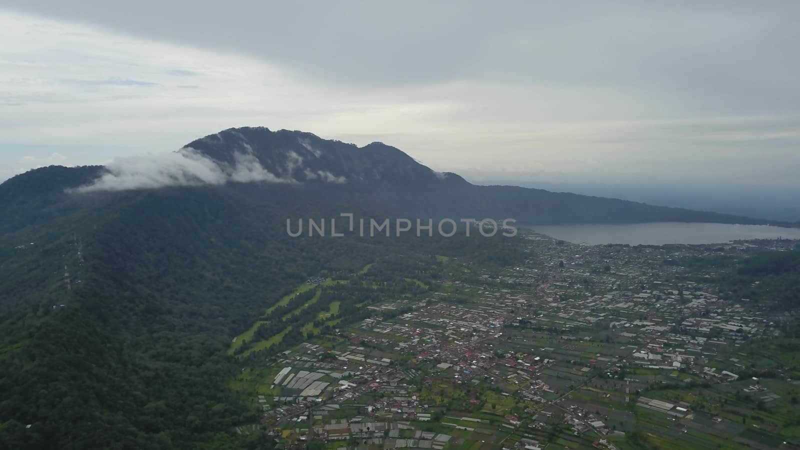 Green Bali landscape. Aerial drone view to Buyan lake and Bedugul village. Indonesia by Sanatana2008