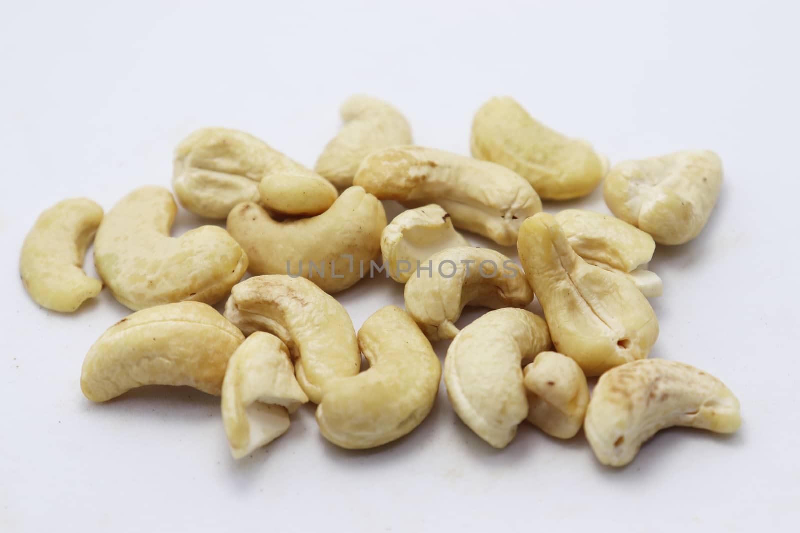 tasty and healthy cashew nut stock on white background