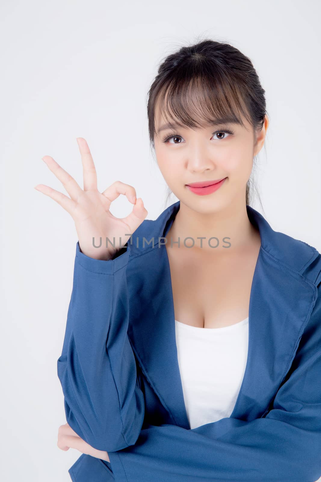 beautiful portrait young business asian woman standing gesture ok sign with confident isolated on white background, asia businesswoman career secretary work success with smiling and happy.