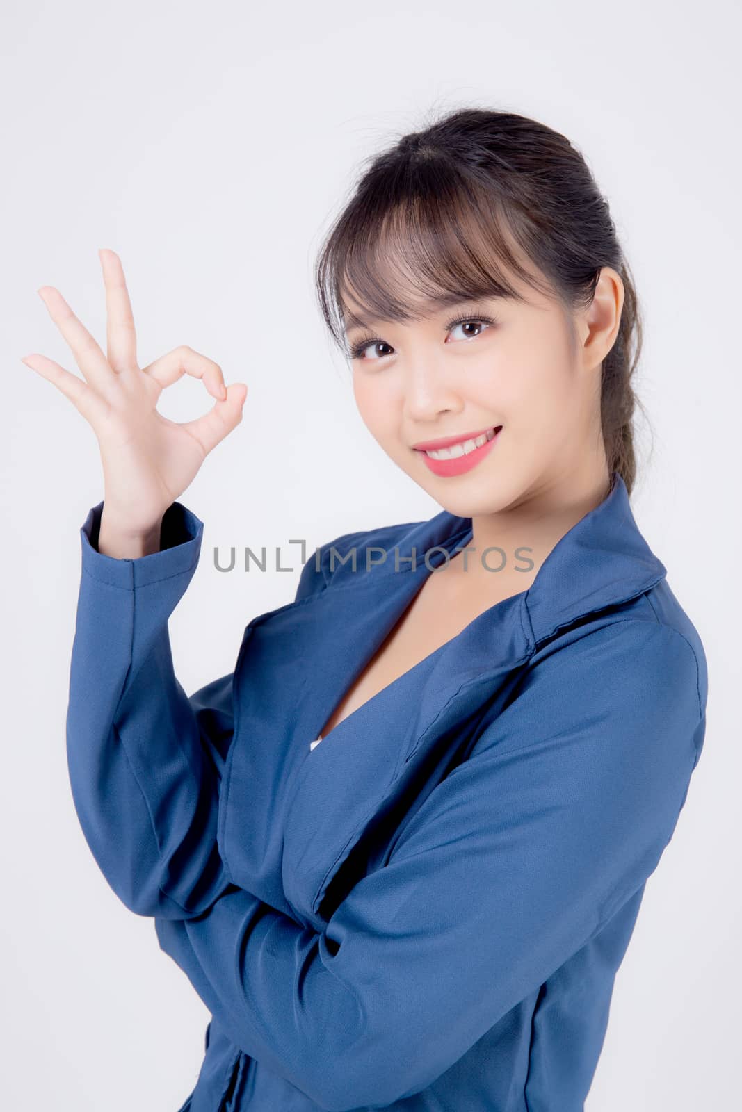 beautiful portrait young business asian woman standing gesture ok sign with confident isolated on white background, asia businesswoman career secretary work success with smiling and happy.