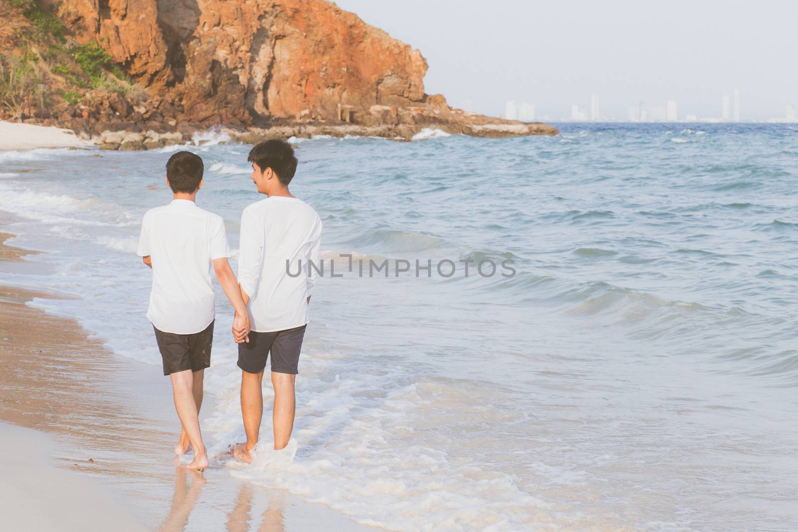 Back view homosexual portrait young asian couple walking with ch by nnudoo
