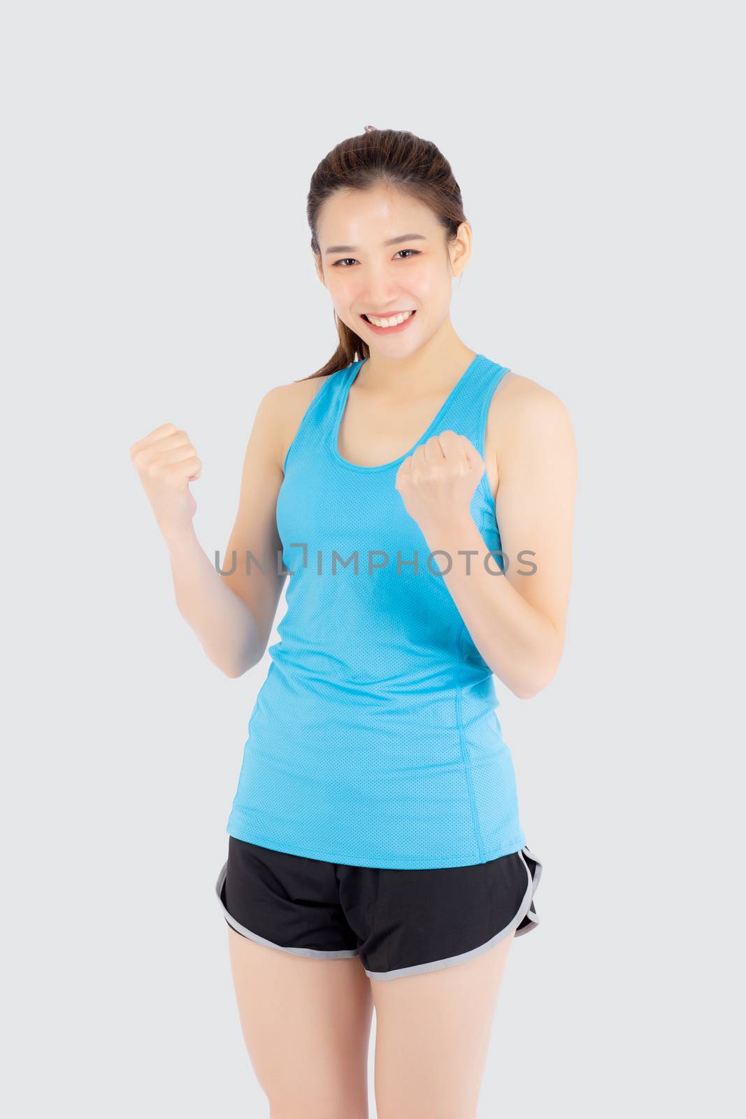 Beautiful portrait young asian woman in sport excited and succes by nnudoo