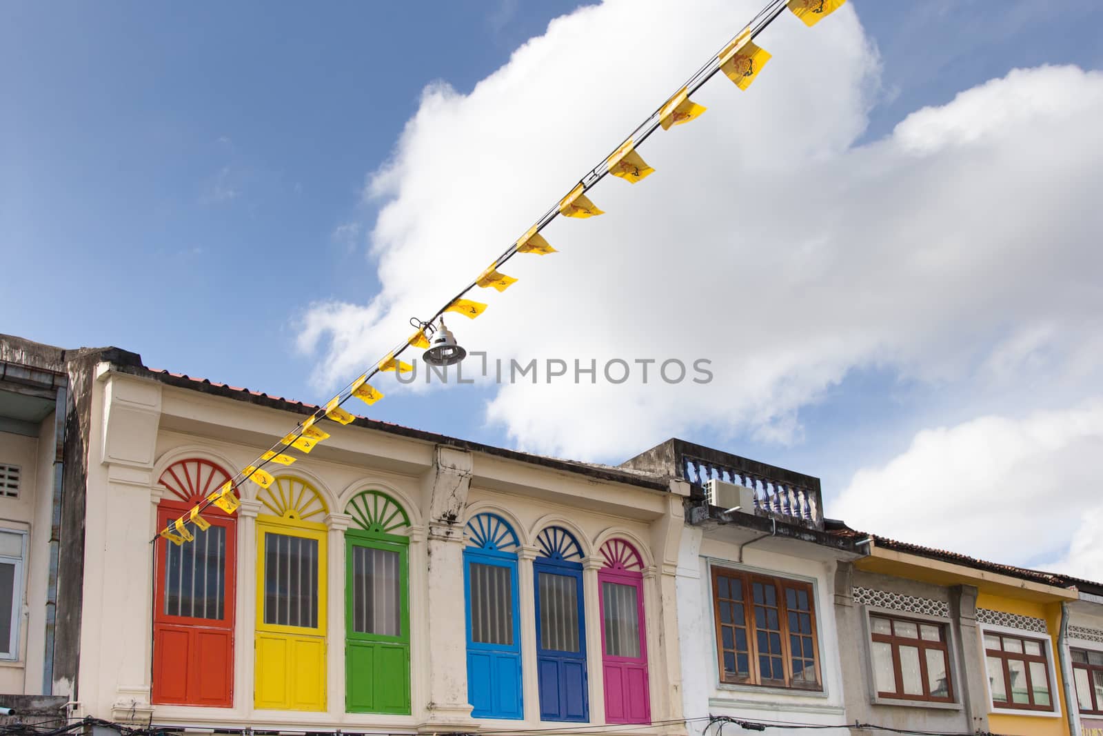 Phuket Thailand 12.6.2015 colourful old town Phuket with prayer flags by kgboxford