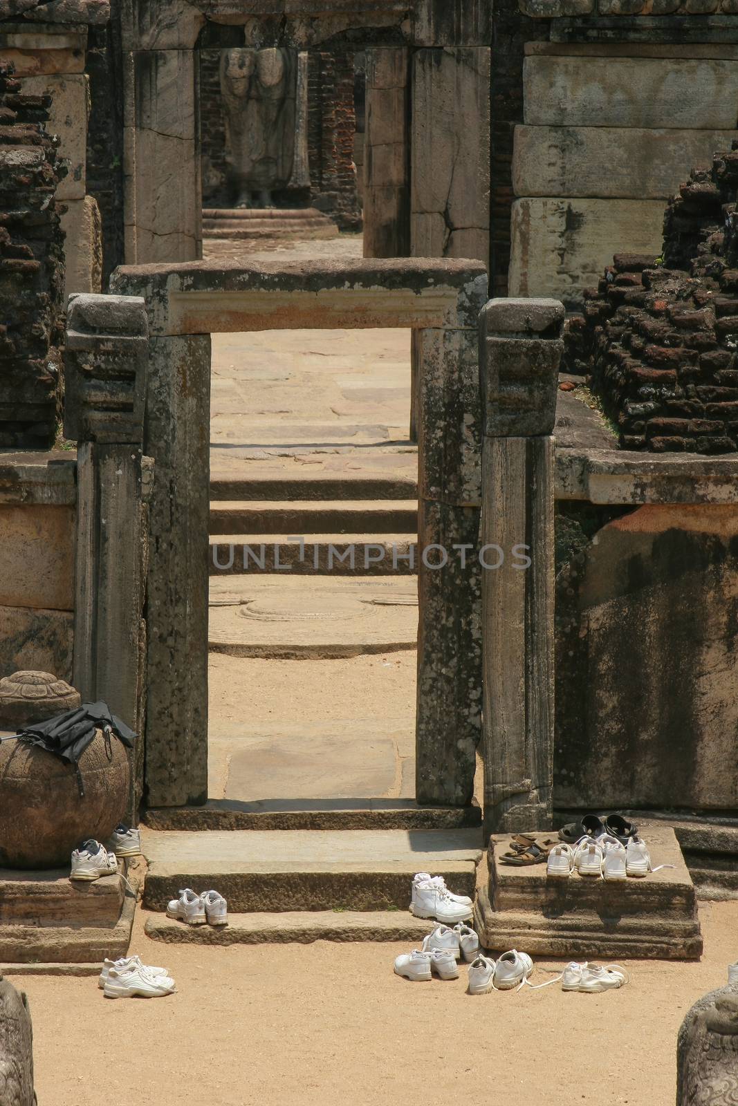 Polonnaruwa Sri Lanka Ancient ruin shoes removed before entering Buddhist shrine by kgboxford