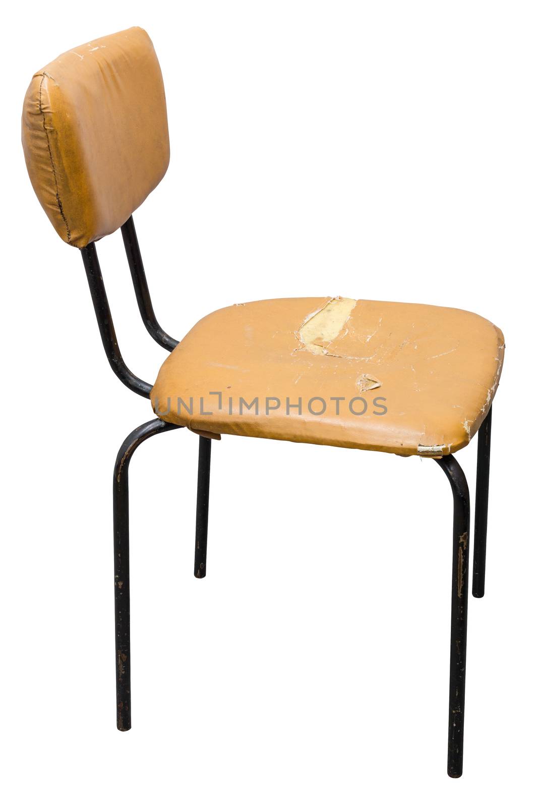 Old orange leatherette chair isolated on white background
