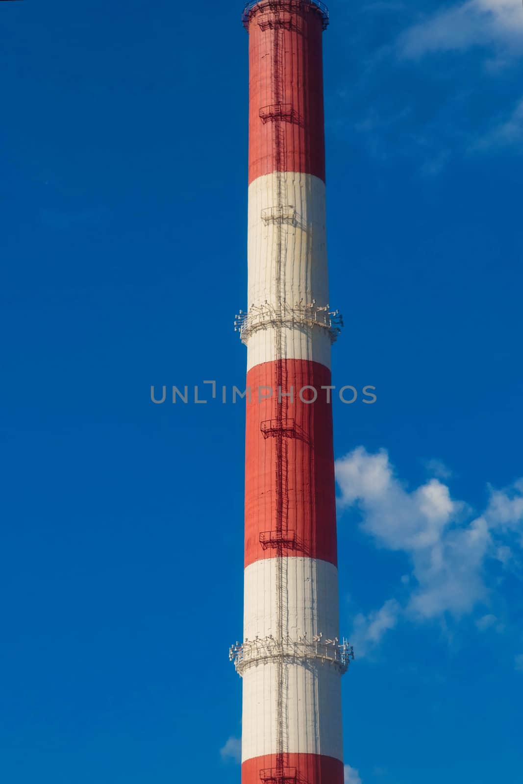 A Big Striped red white industrial chimney by galinasharapova