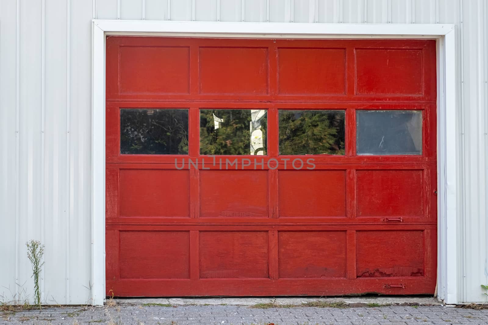 Red garage door with windows and handles by colintemple