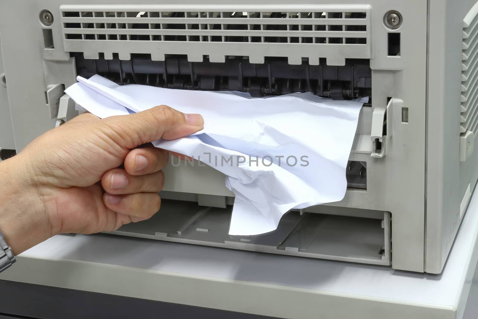 Technicians Removing Paper Stuck, Paper Jam In Printer At Office