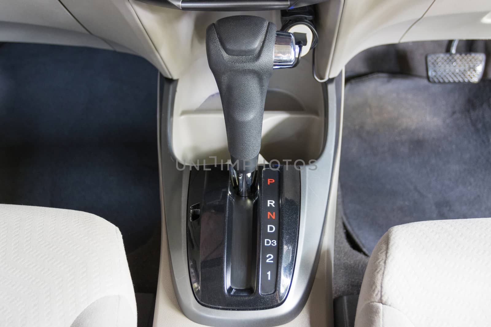 Close up the symbol of each auto gear for car shifting into P will try to engage the parking pawl to prevent the transmission