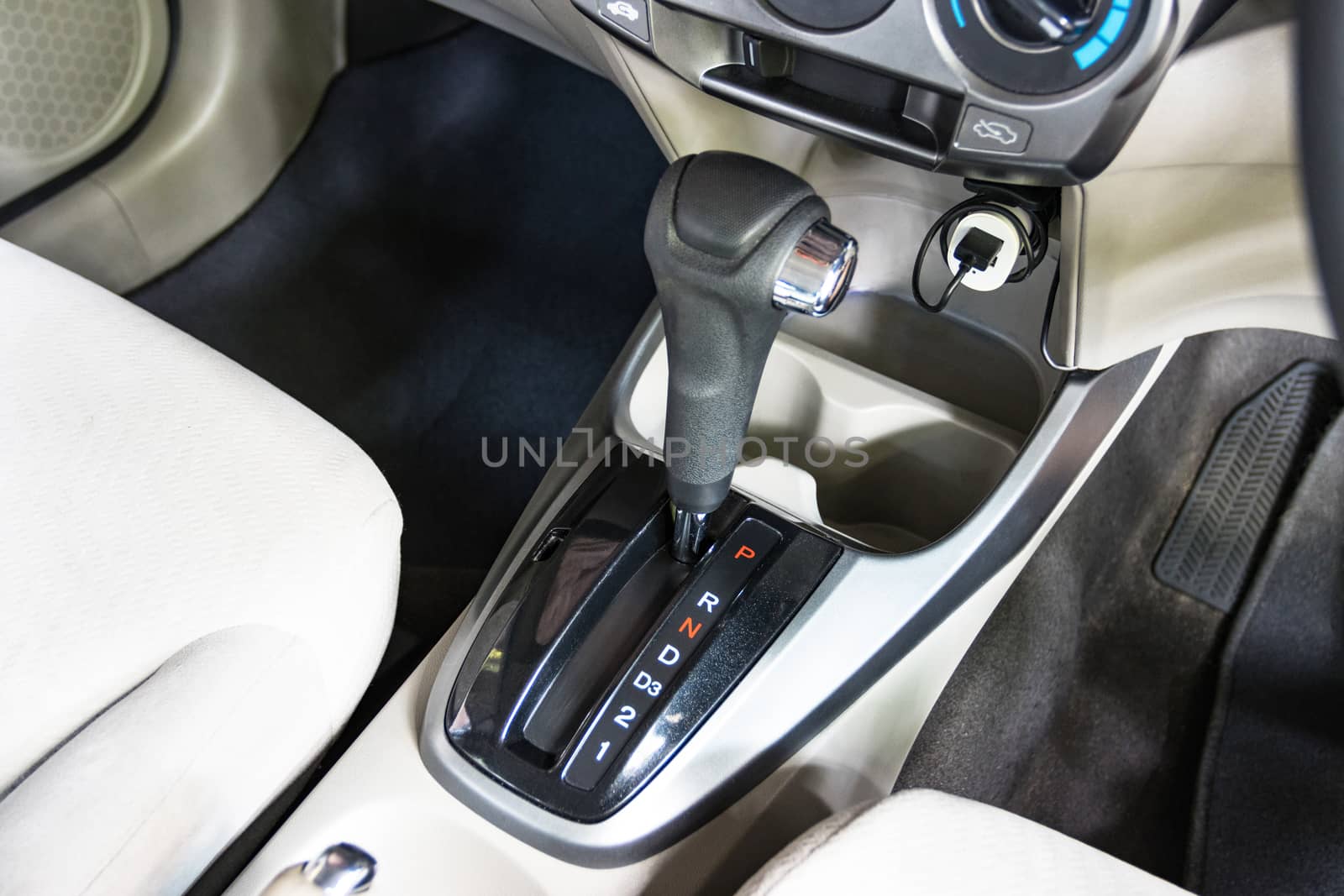 Close up the symbol of each auto gear for car shifting into P will try to engage the parking pawl to prevent the transmission