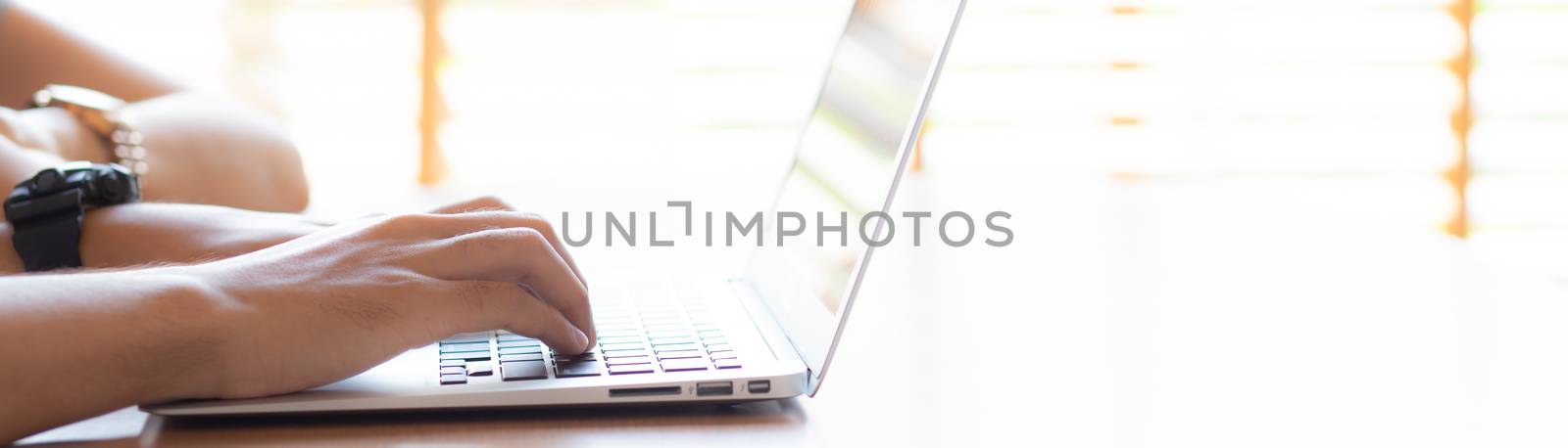 Asian young couple using laptop computer think and searching int by nnudoo