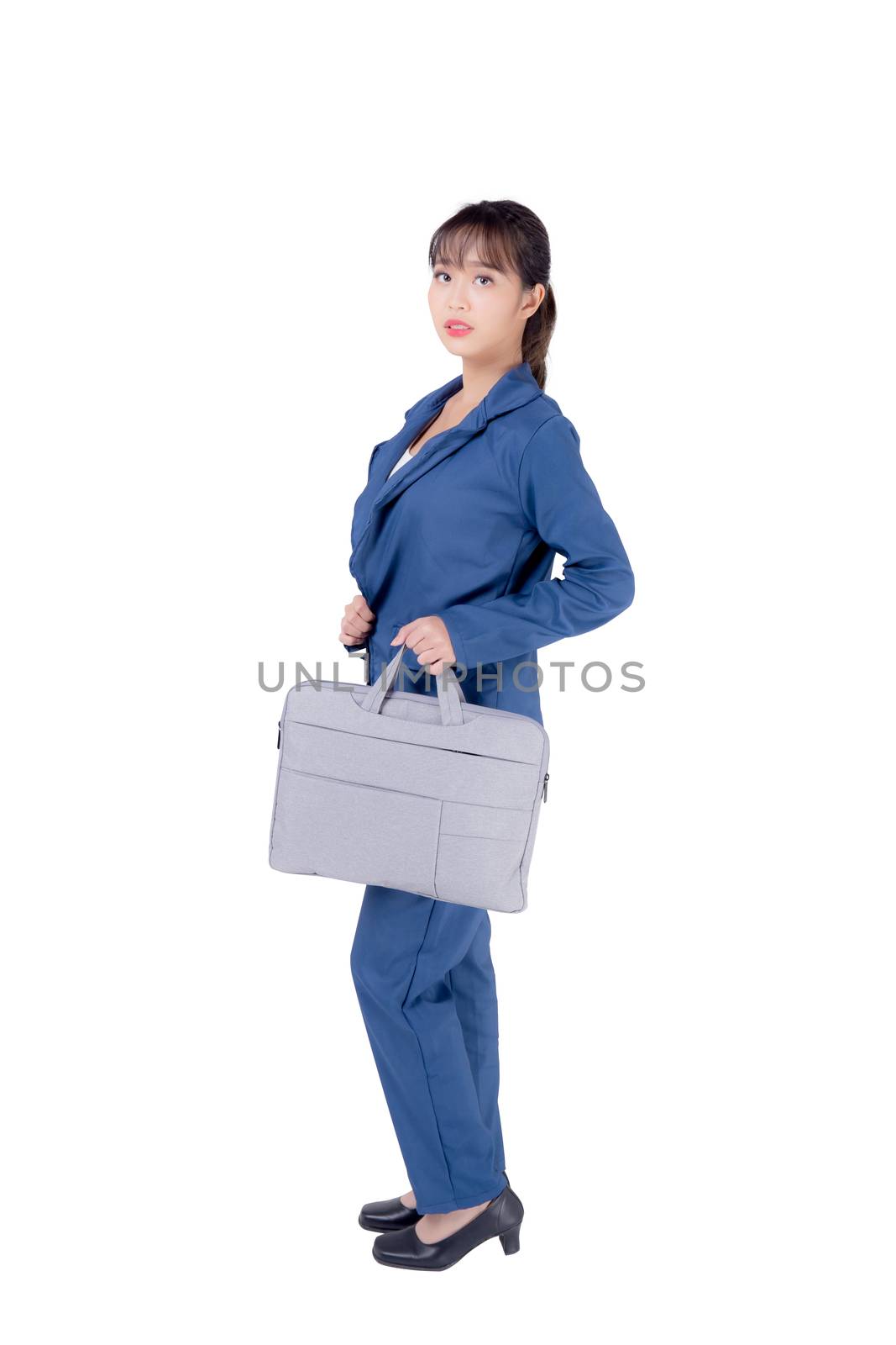 Beautiful portrait young business asian woman holding a briefcas by nnudoo