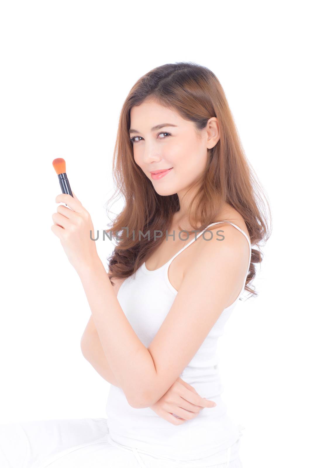 Beauty of portrait asian woman applying make up with brush of ch by nnudoo