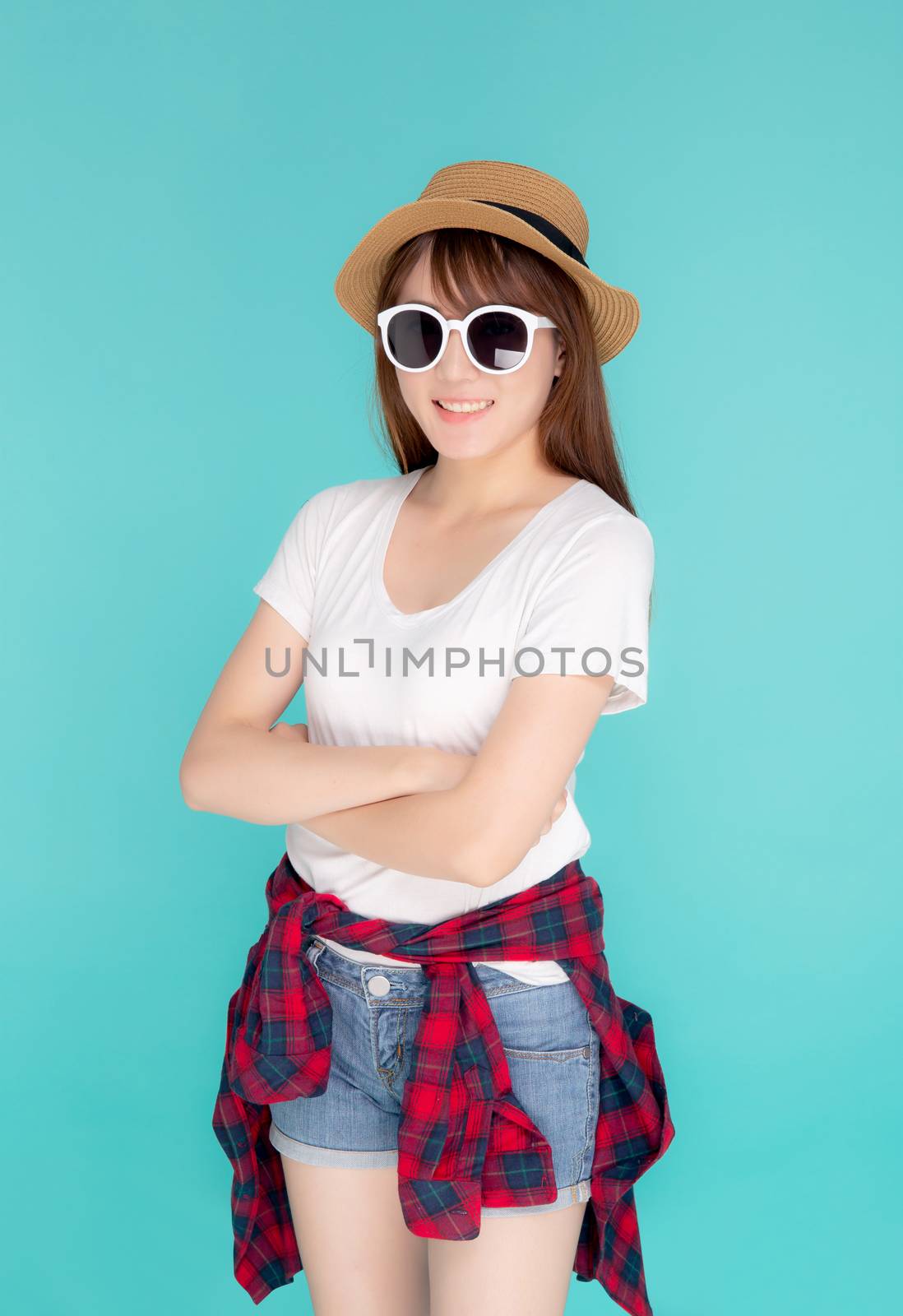 Beautiful portrait young asian woman wear hat and sunglasses smi by nnudoo