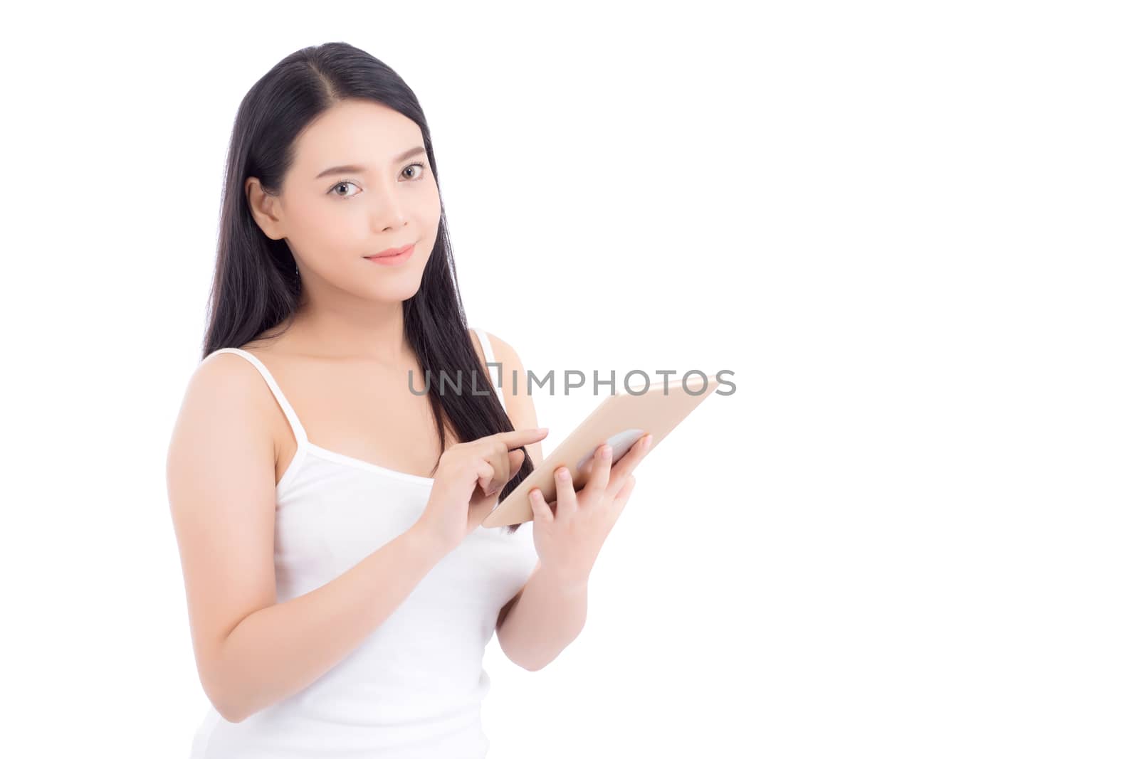 Portrait of asian young woman standing touch blank screen tablet isolated on white background, girl showing technology, business and communication concept.