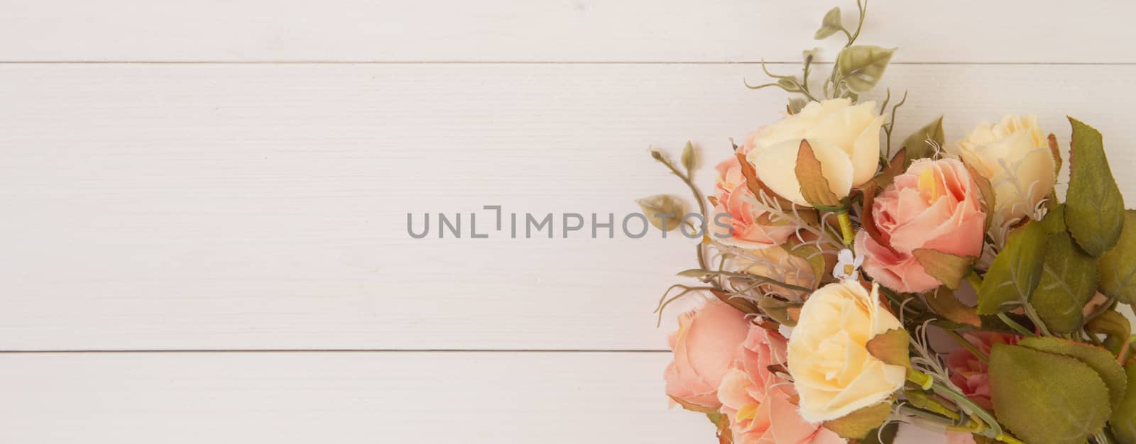 Beautiful flower on wooden background with romantic, mother day or valentine day, spring or summer nature background for decoration, bouquet floral for gift on desk, holiday concept, banner website.