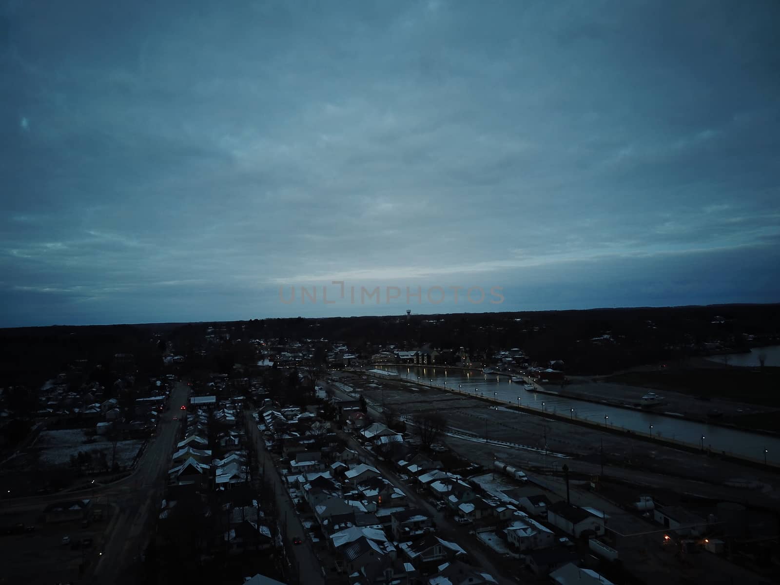 aerial view of the town of Port Stanley Ontario during a winter night by mynewturtle1