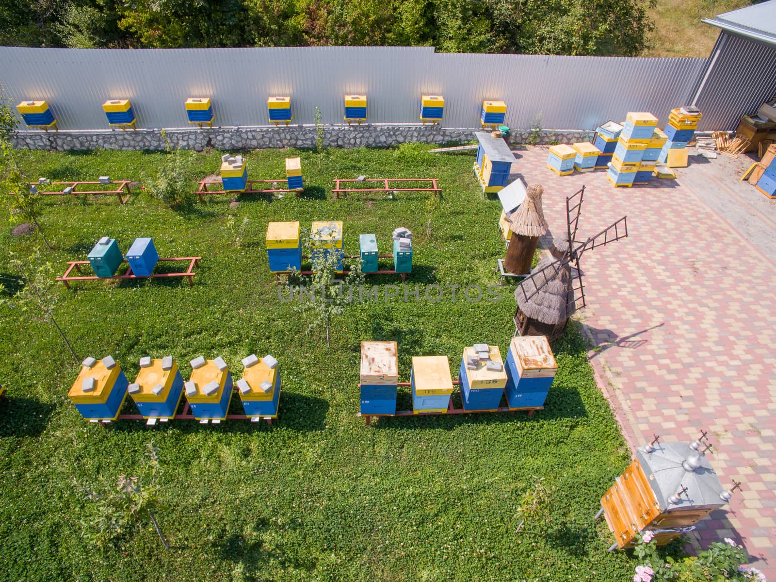 There are many bee hives in the new apiary. Industrial beekeeping by TrEKone