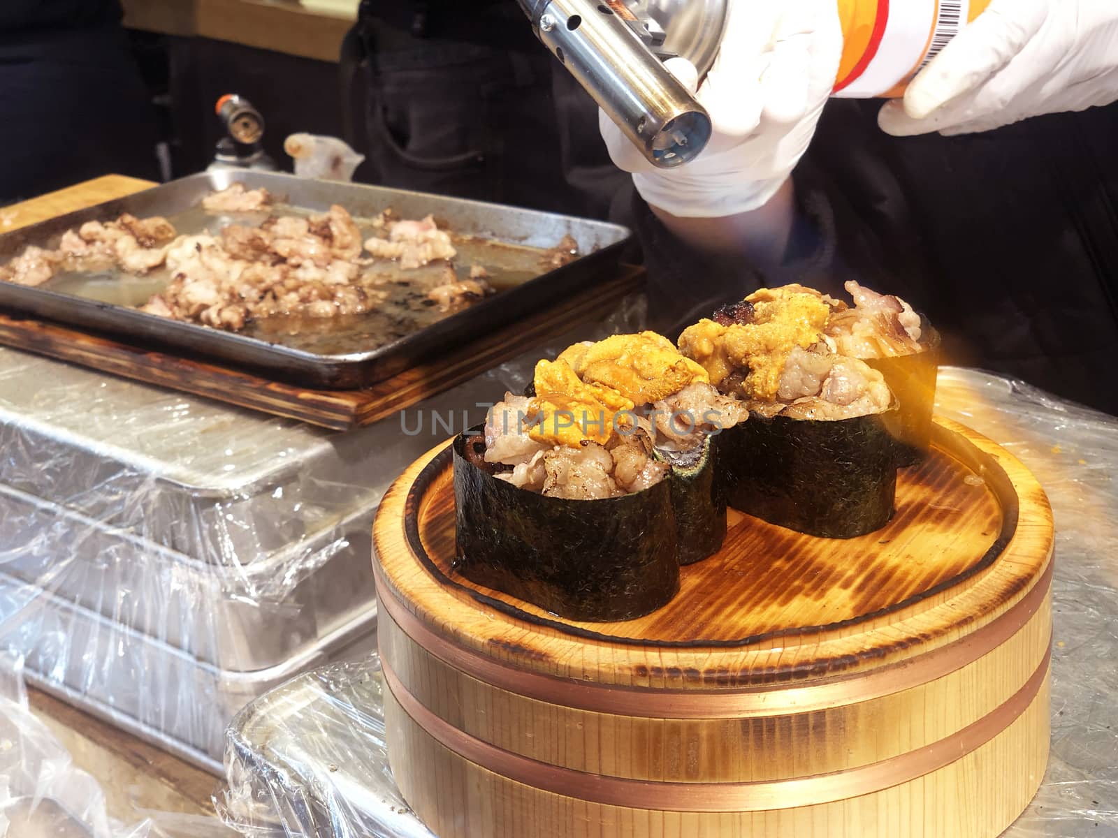 Street food process to cooking  beef sushi most popular delicious food in tsukiji fish market,  Japan