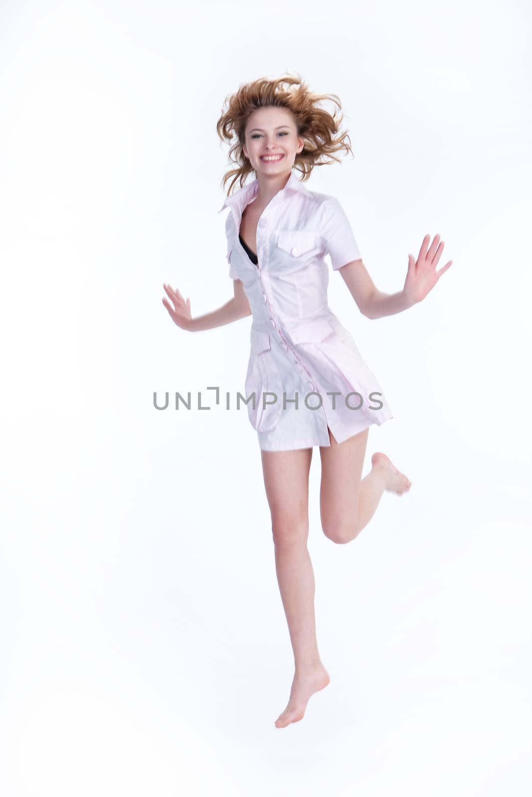 Young Woman Jumping by Fotoskat