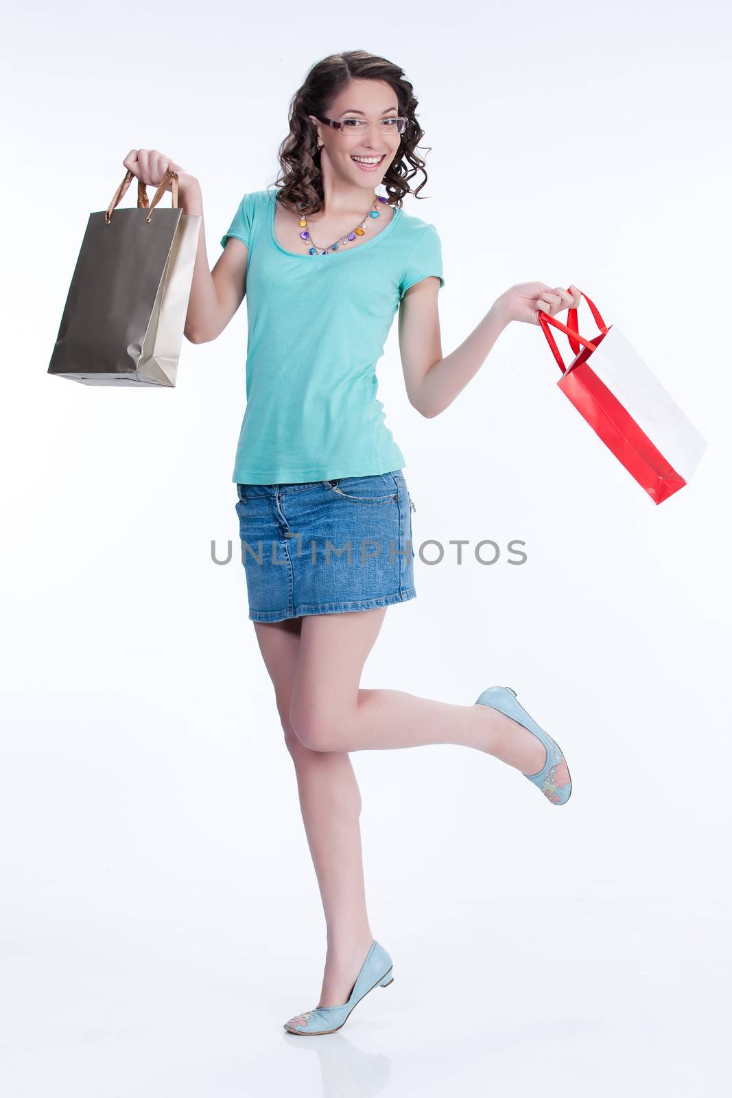 Young woman with shopping bag in different actions and emotions