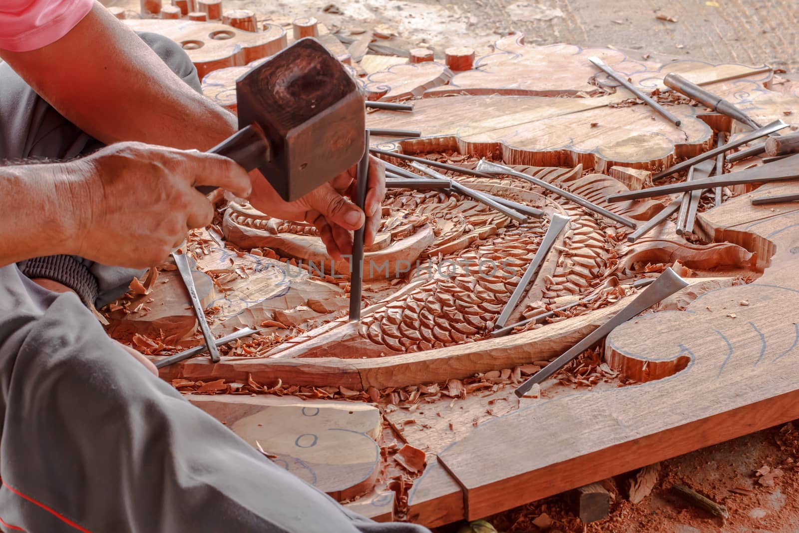 Carpenter and carve work  by Praphan