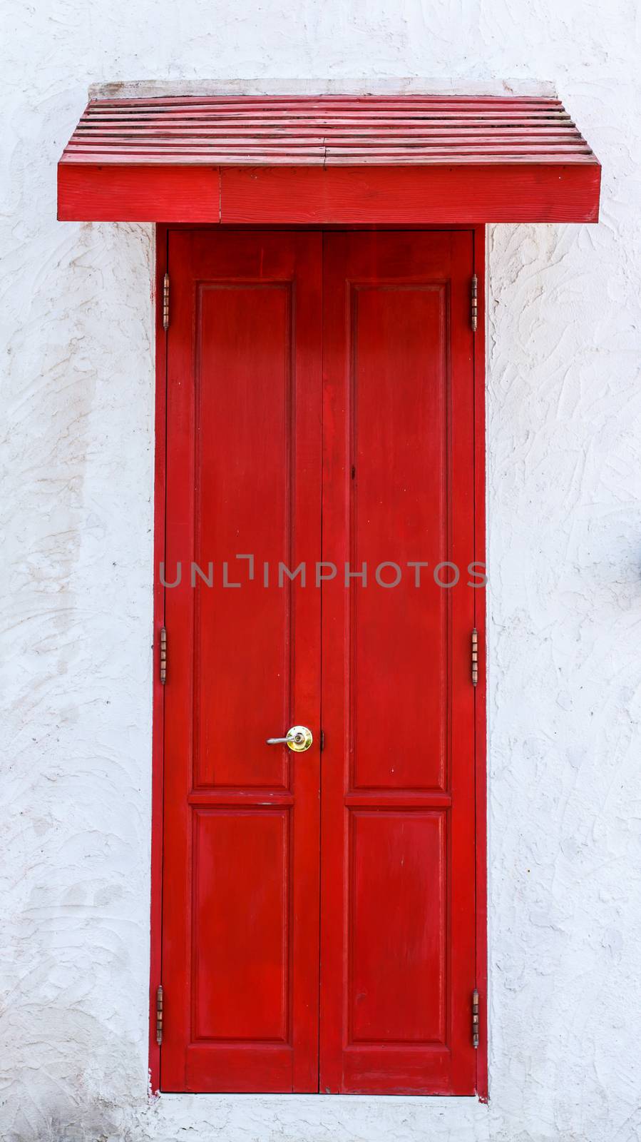 Red wooden door  by Praphan