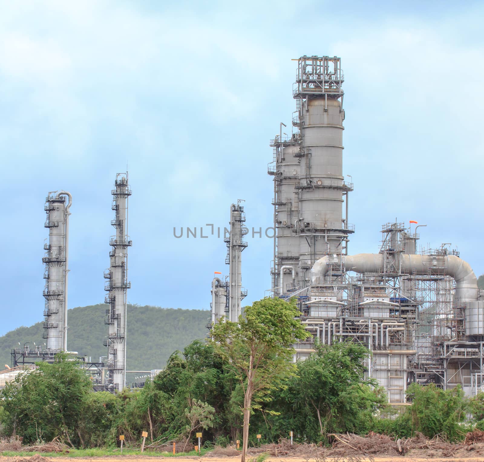 Oil Refinery in daytime by Praphan