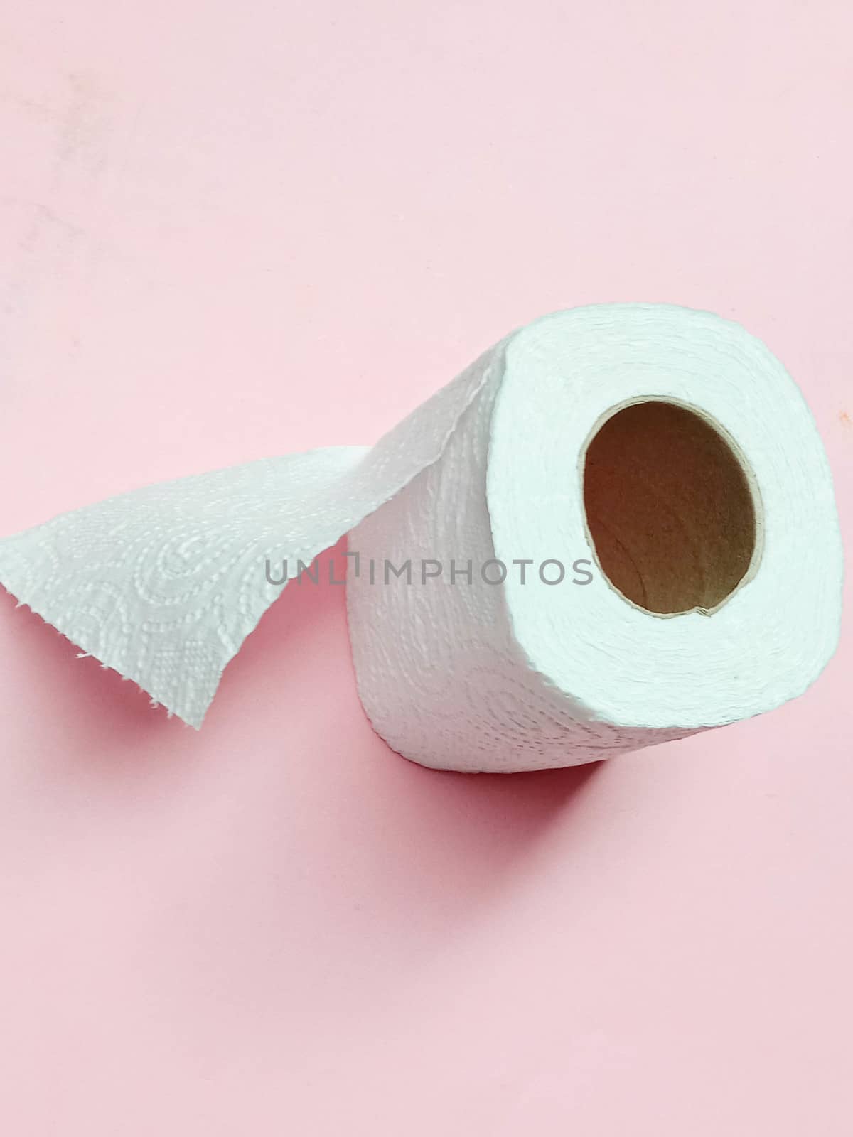 toilet paper tissue closeup on pink by jahidul2358