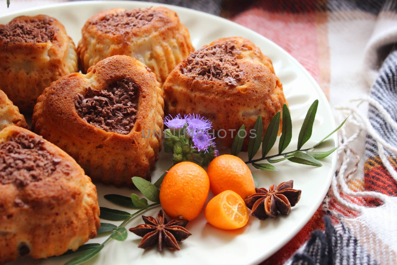 Heart-shaped cupcakes decorated with grated chocolate.Texture or background
