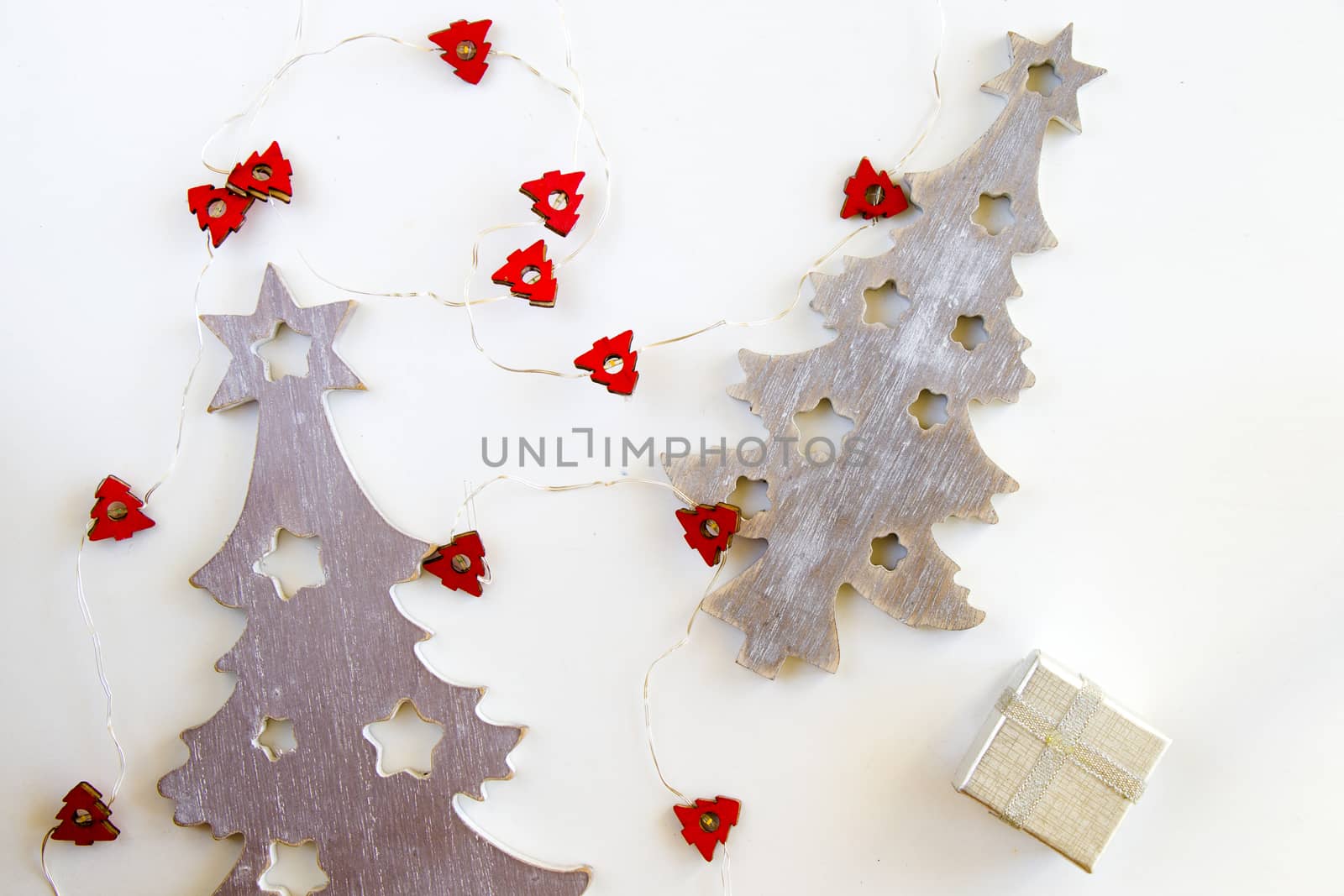 Merry christmas and happy new year set background, tree and garland on the white background by Taidundua