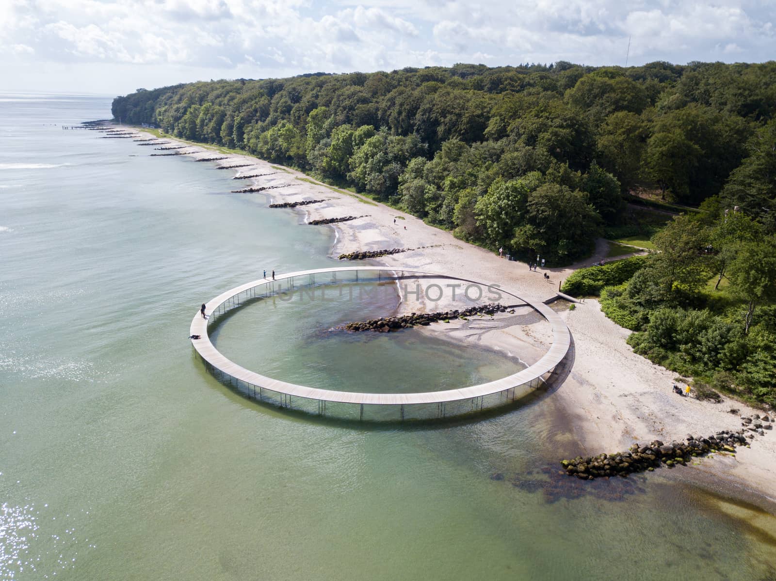 Aarhus, Denmark - June 9, 2019: Aerial drone view of the Infinity Bridge, a work of art by architect Niels Povlsgaard and Johan Gjoedes.