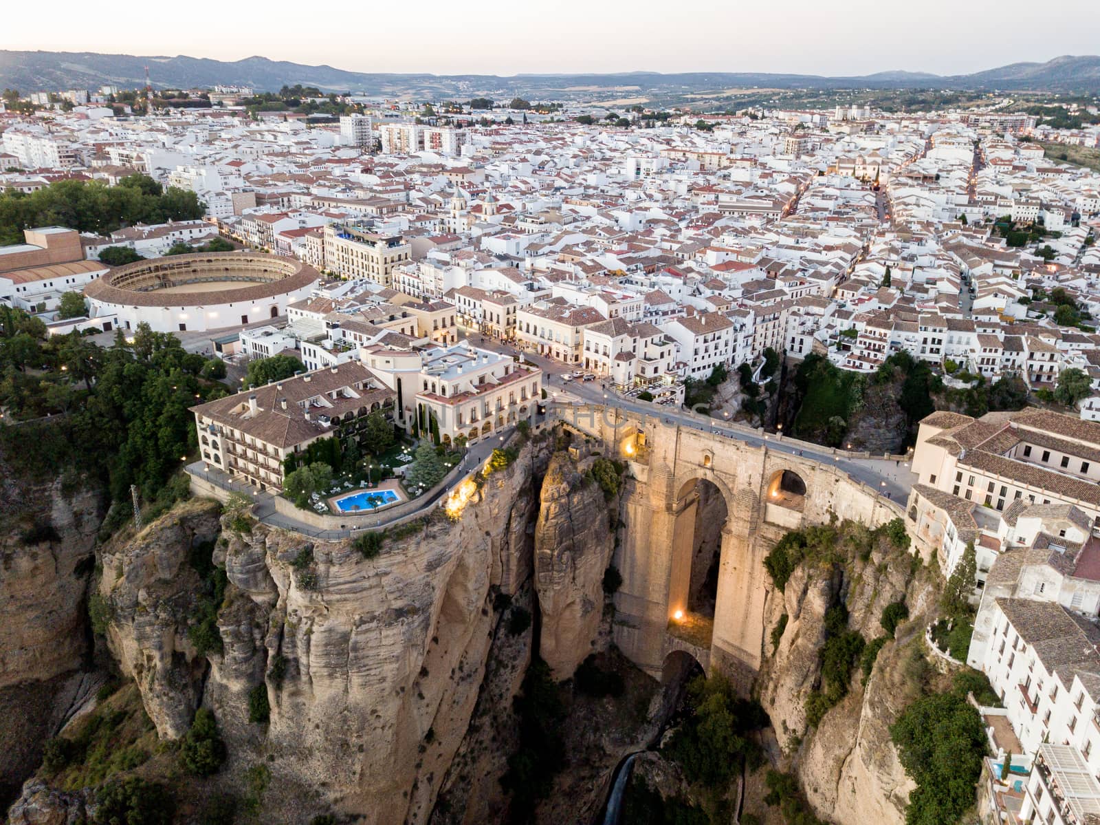 Ronda, Spain - May 31, 2019: Aerial Drone view of the famous bridge Puente Nuevo in the historic city centre.