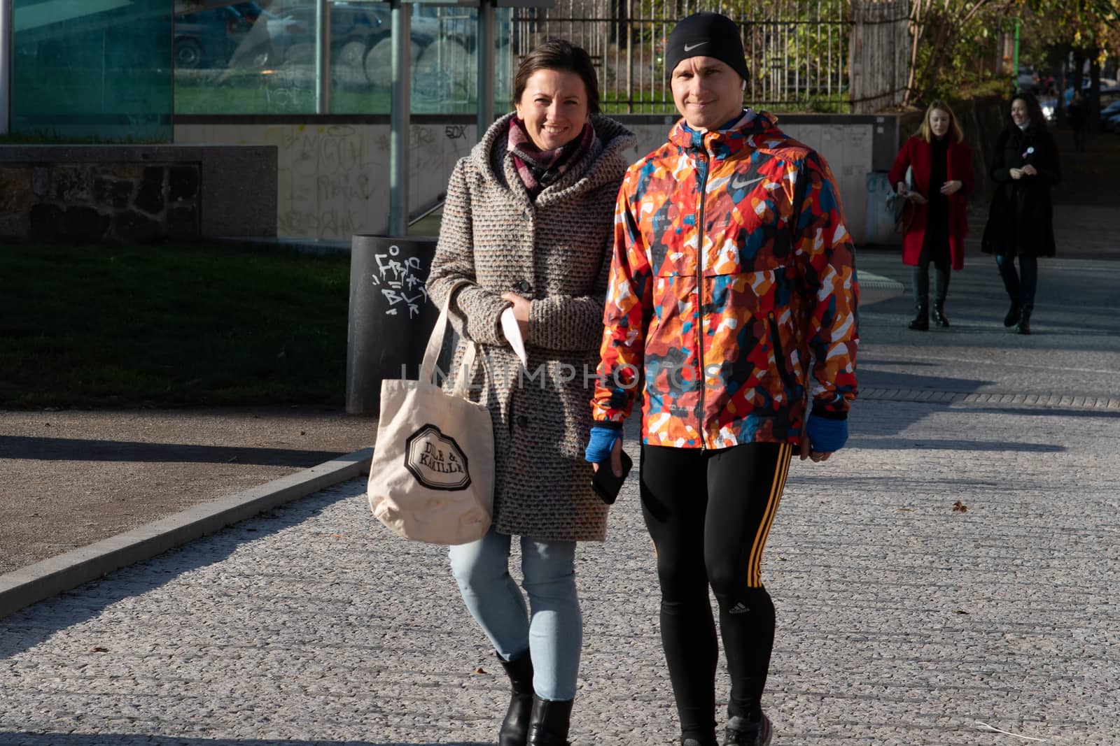 11/20/2020. Prague, Czech Republic. People during quarantine period due to coronavirus at Hradcanska metro stop in Prague. Women are walking.