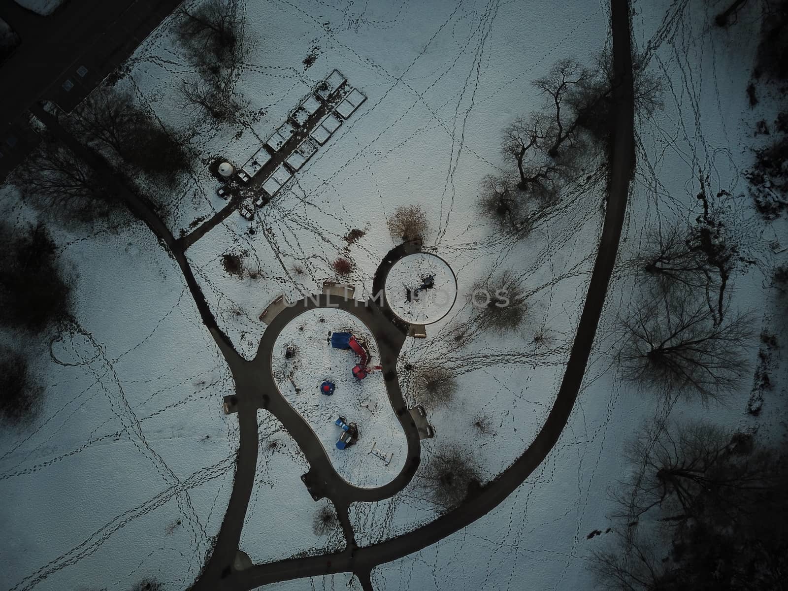 aerial view of a winter park with lots of trails and a playground. High quality photo